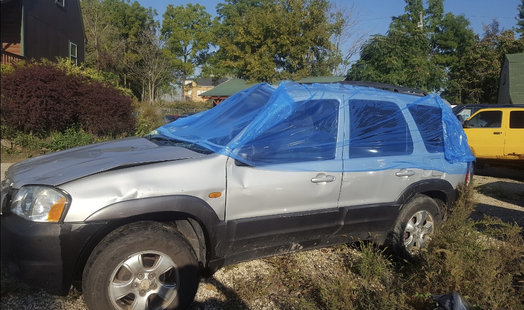 The silver Mazda SUV I rolled while drunk